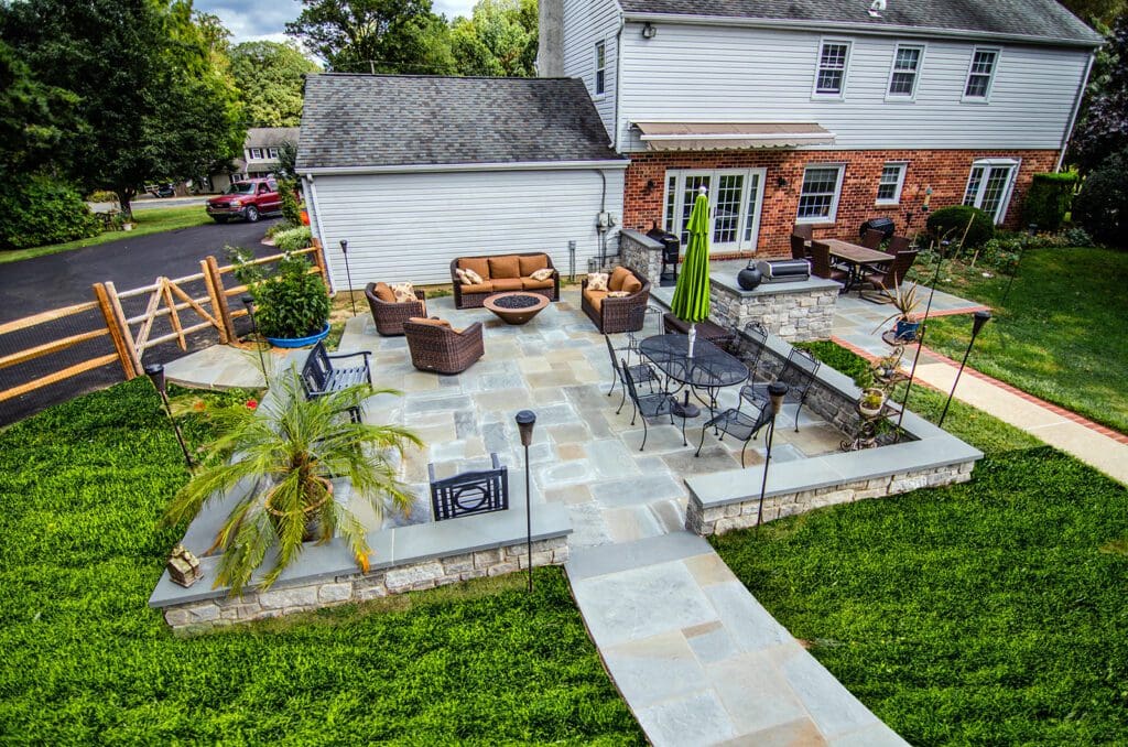 an aerial view of a stone patio