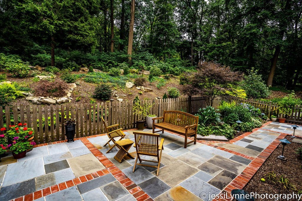 Stone patio with fence
